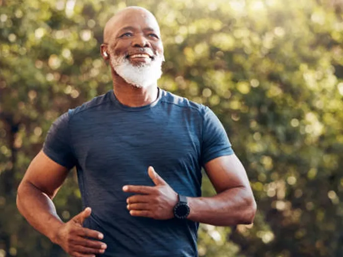 Mature man running outdoors